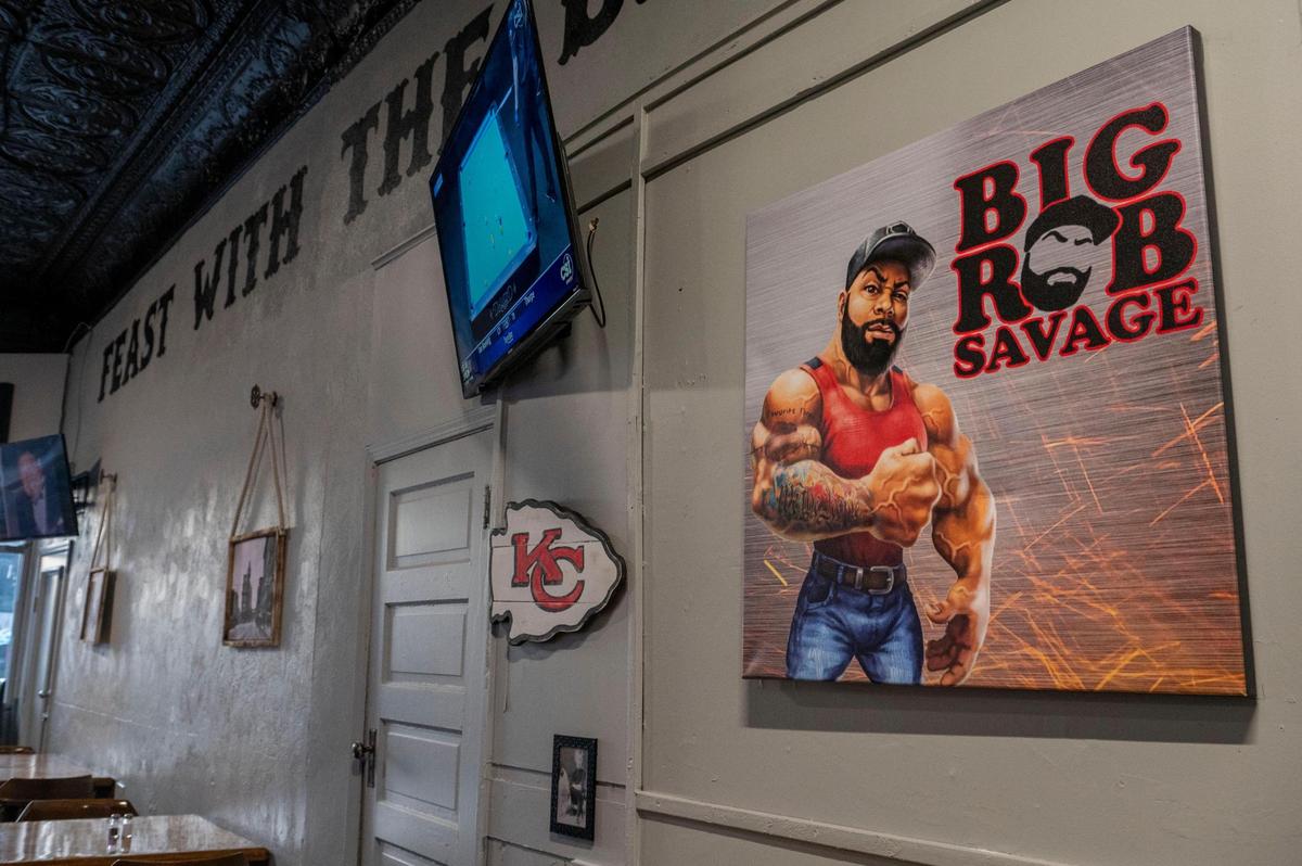 A painting of co-owner Robert “Big Rob Savage” McDaniel.hangs on a wall at Savage Saloon.