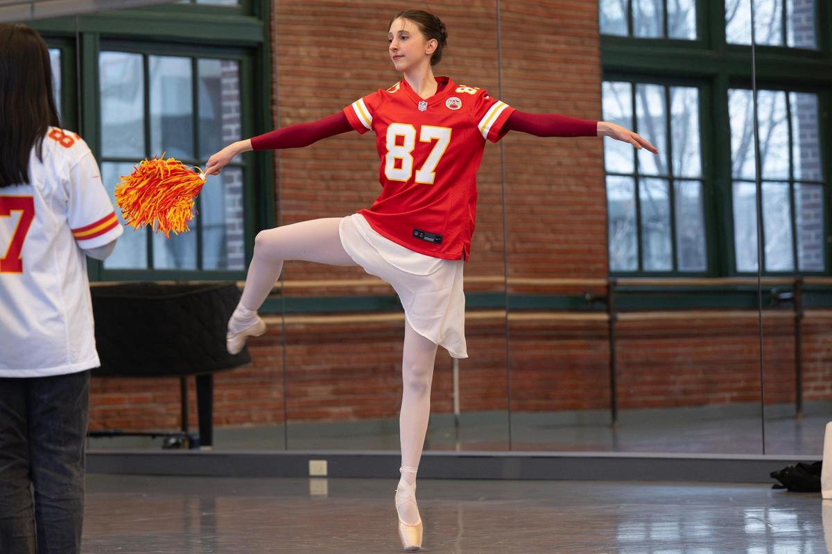 Ballet dancer Sidney Haefs twirls a Chiefs-themed pompom during while she rehearses for the recording of the dance-off.
