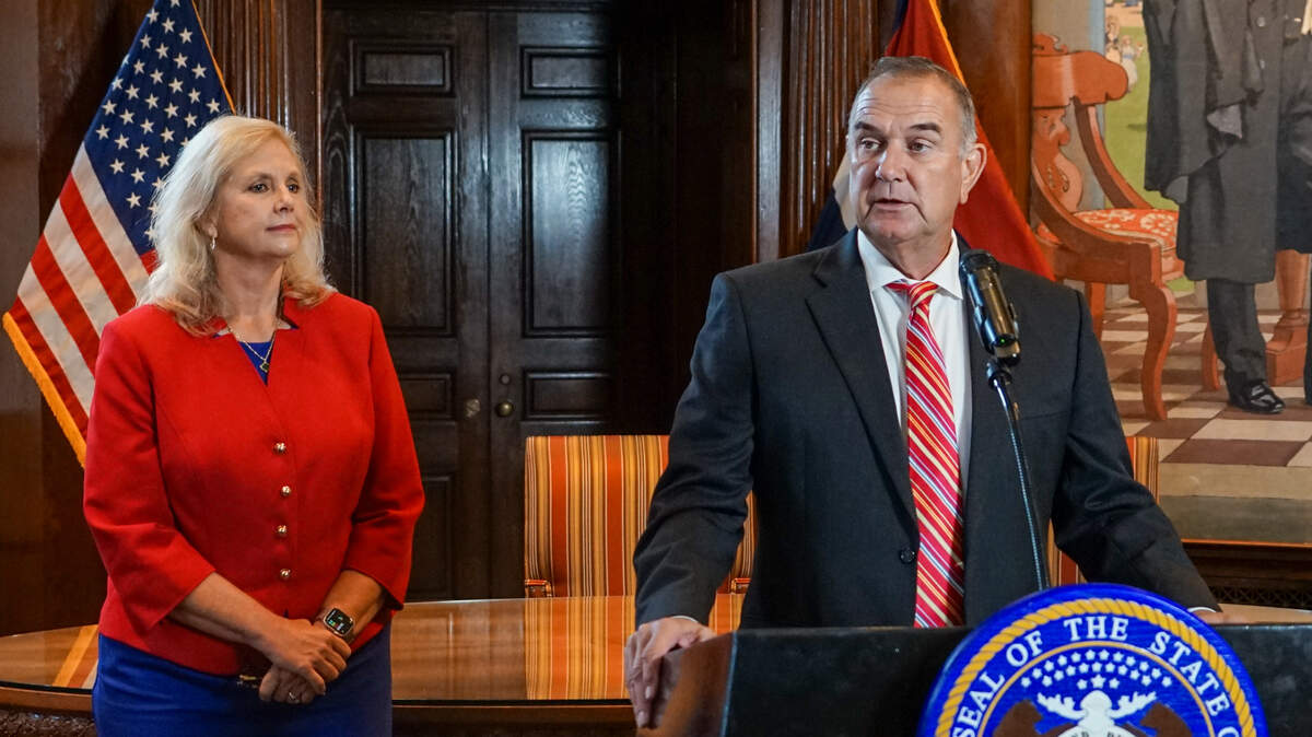 Missouri Gov. Mike Kehoe, right, announces Catherine Hanaway, left, as the state’s next attorney general.