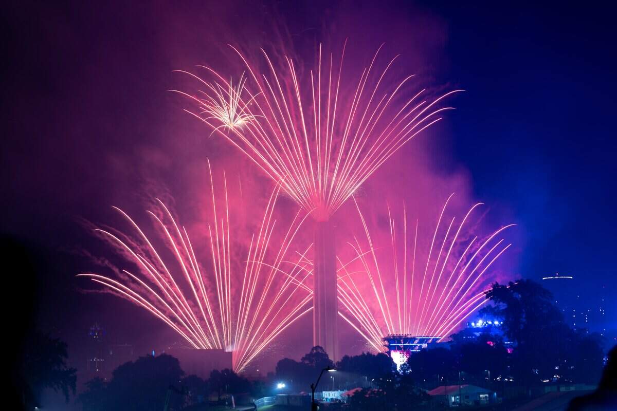 Fireworks light up the night sky over Penn Valley Park on Saturday, July 4, 2026. The National WWI Museum and Memorial's Stars and Stripes Picnic celebrates America's 250th and the Memorial's 100th