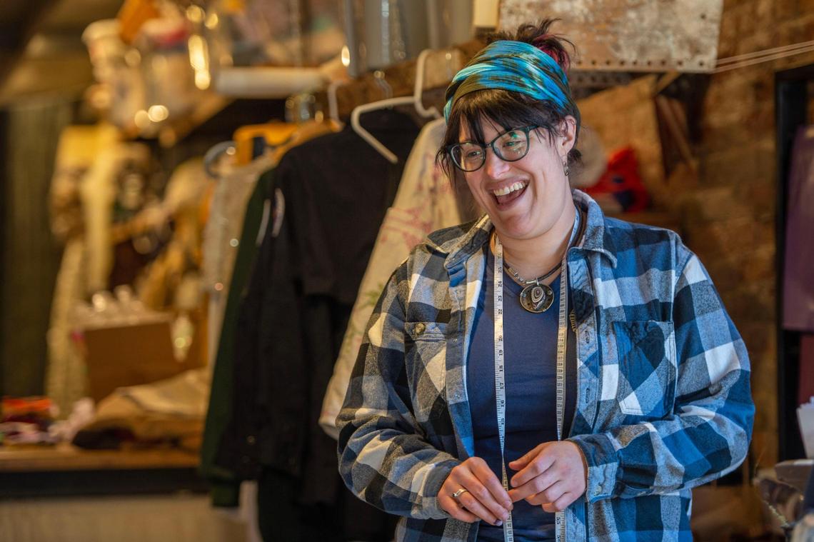 Tara Killingsworth, owner of The Ivory Thimble apparel design studio and boutique in Lindsborg, helps a customer. Killingsworth moved back to the Smoky Valley and opened the shop after graduating from Kansas State University’s fashion studies program and working in costume design in Los Angeles.