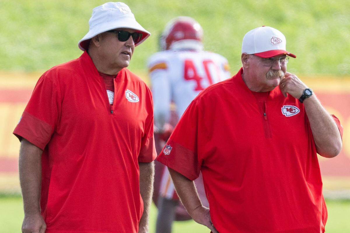 Kansas City Chiefs special teams coach Dave Toub and head coach Andy Reid watch practice at Chiefs Training Camp on Tuesday, Aug. 12, 2025, in St. Joseph.