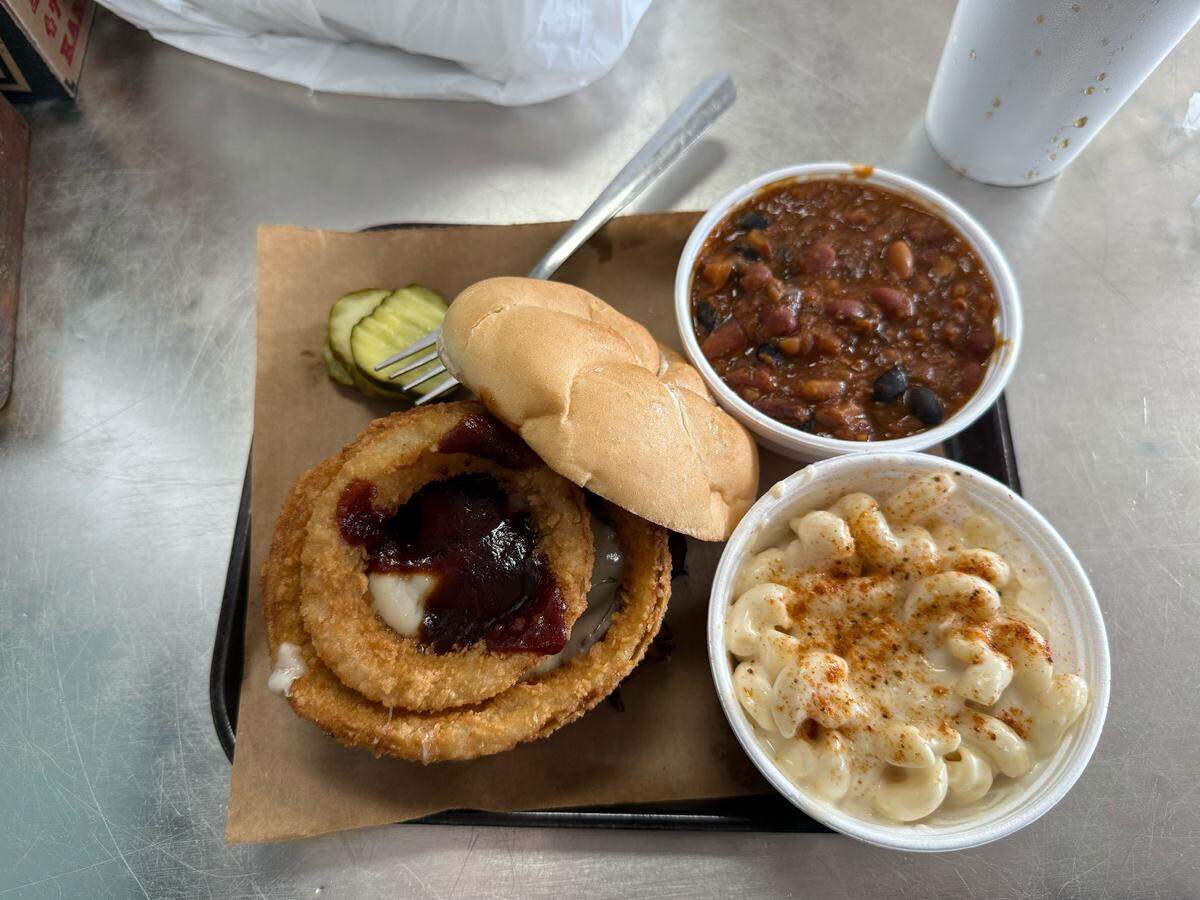 The Z-Man sandwich from Joe’s Kansas City Bar-B-Que, 3002 W. 47th Ave., with a side of mac and cheese and barbecue beans.