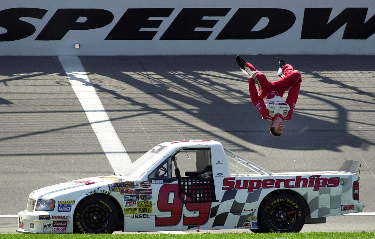 Columbia, Missouri native Carl Edwards did his signature victory back-flip after winning the O’Reilly Auto Parts 250 at Kansas Speedway in 2004.