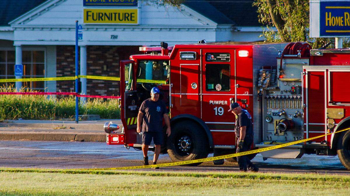 Firefighters with the Kansas City, Kansas Fire Department remain at the scene Tuesday morning after a police officer was critically injured. A driver fleeing police allegedly swerved intentionally toward the Kansas City, Kansas police officer, who was deploying tire-deflating devices, and struck them. The officer was rushed to the hospital with life-threatening injuries following the crash near West 75th Street and State Avenue in Kansas City, Kansas.
