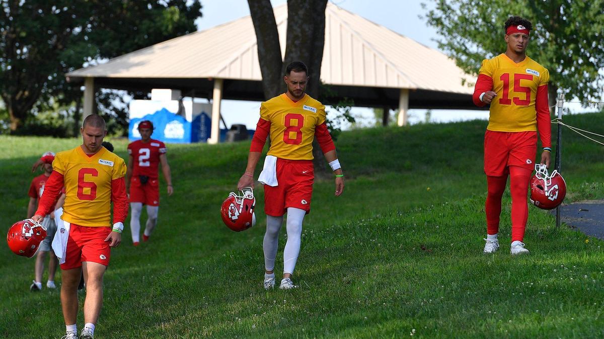 Kansas City Chiefs quaterback Patrick Mahomes, right, joined teammates Shane Beuchele, left, and Anthony Gordon for the walk from the dorm to the pratice field Saturday, as the Chiefs opened training camp for limited players at Missouri Western State University in St. Joseph. The entire team reports Monday.