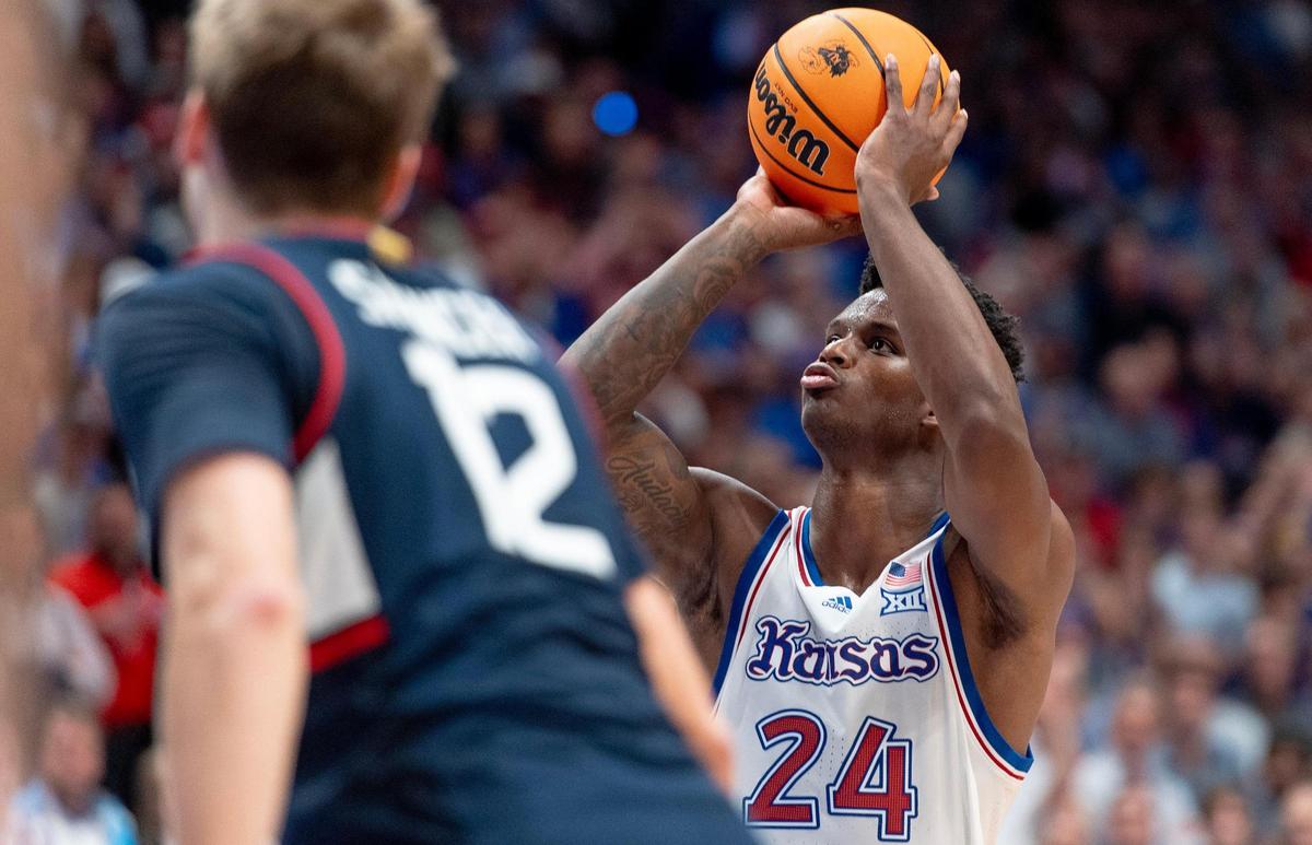 Kansas Jayhawks forward K.J. Adams Jr. (24) shoots a free throw during an NCAA basketball game against the Connecticut Huskies on Friday, Dec. 1, 2023, in Lawrence, Kan.