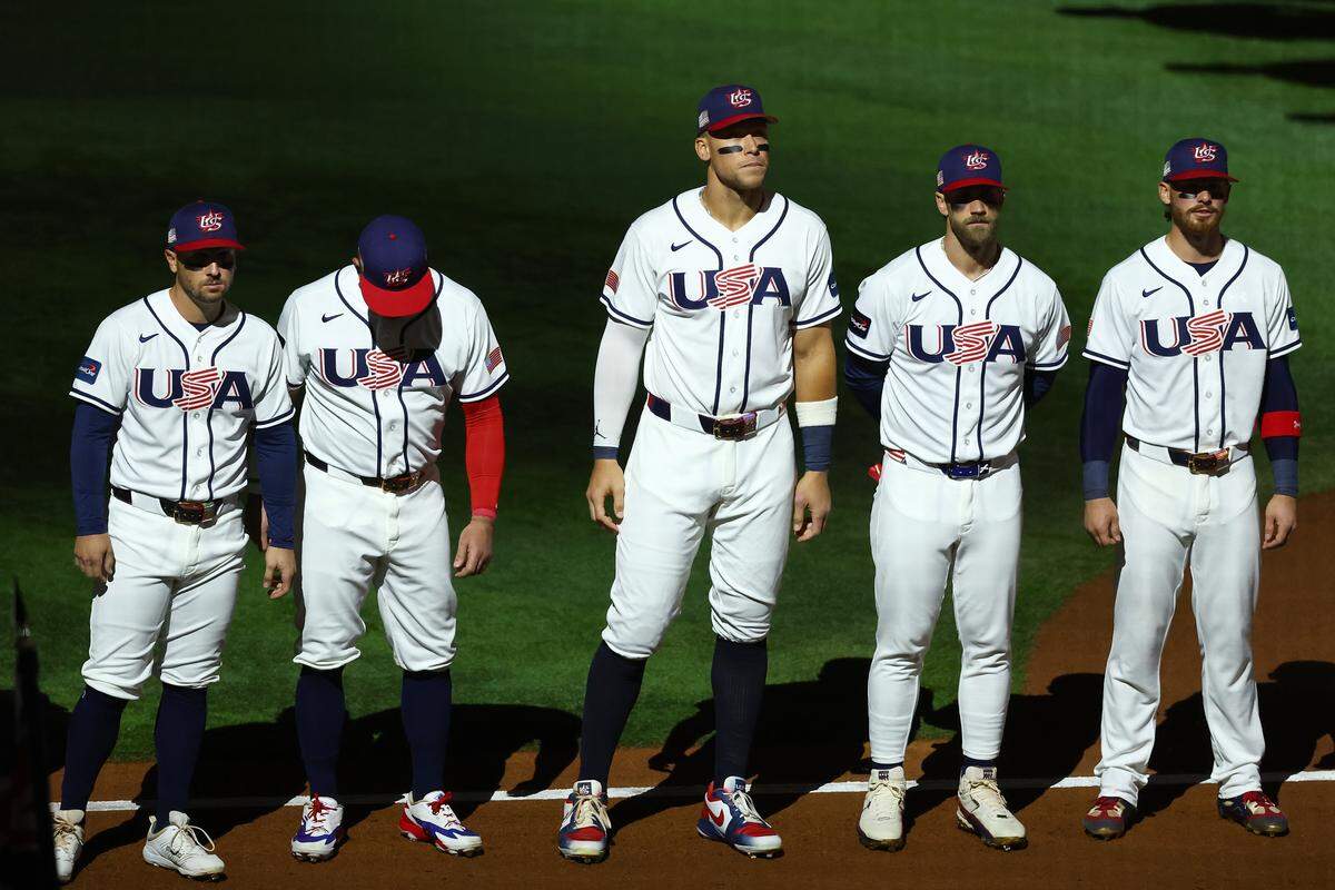 Aaron Judge #99 of Team United States stands with teammates before the game against Team Venezuela at loanDepot park on March 17, 2026 in Miami, Florida.