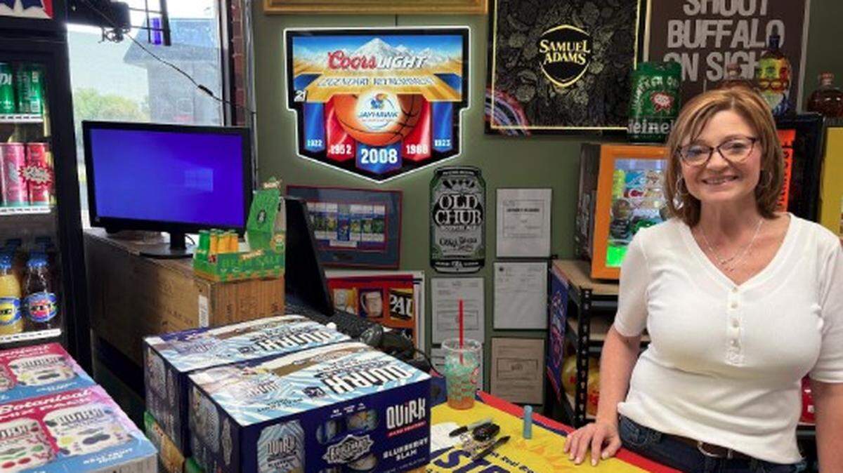 Jennifer Ankenbauer, owner of Kansas Crown Beer, Wine and Spirits, says her store, like others, depends on evening traffic, which can drop off sharply when it gets dark early.