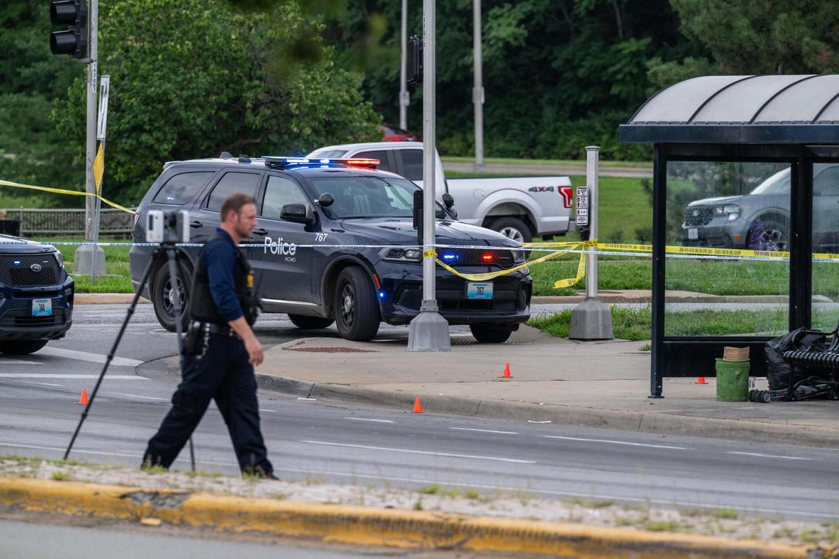 KCPD crime scene investigators observe the scene of a KPCD officer involved shooting near Emmanuel Cleaver II Blvd and The Paseo on Thursday, July 24, 2025.