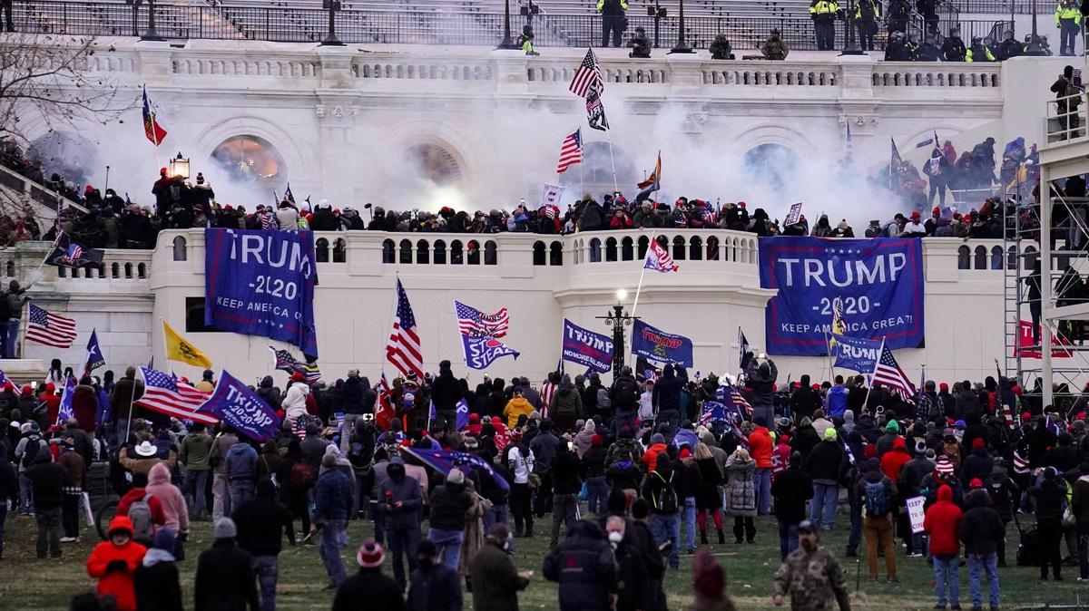 Violent protesters, loyal to President Donald Trump, storm the Capitol, Wednesday, Jan. 6, 2021, in Washington. It’s been a stunning day as a number of lawmakers and then the mob of protesters tried to overturn America’s presidential election, undercut the nation’s democracy and keep Democrat Joe Biden from replacing Trump in the White House. (AP Photo/John Minchillo)