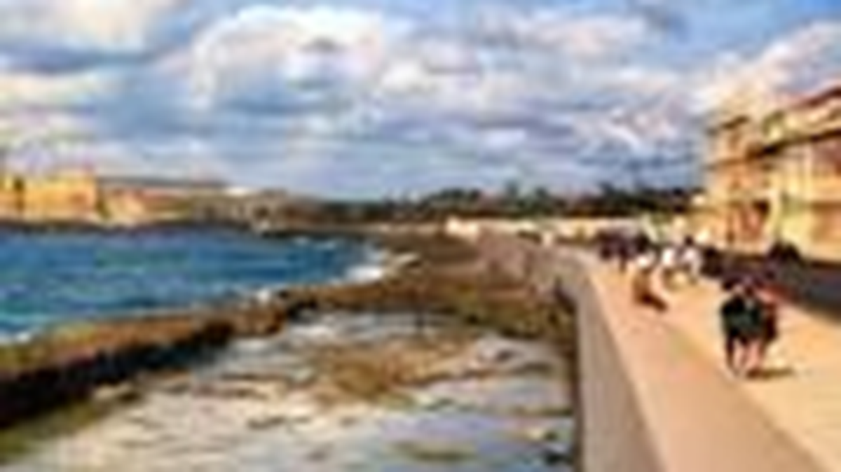 The Malecon is five-mile walk along Havana harbor, where hard-up Cubans walk to find comfort.
