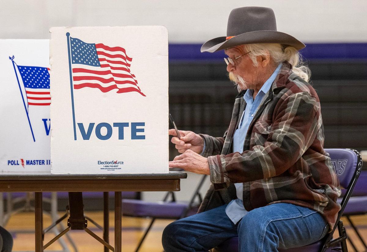 Michael J. Tatum of Raytown voted on whether to issue a 40-year, 3/8th-cent sales tax to help pay for a new Royals stadium in the Crossroads and renovations to the Chiefs’ Arrowhead Stadium at the polling place Tuesday, April 2, 2024, at Raytown Central Middle School.