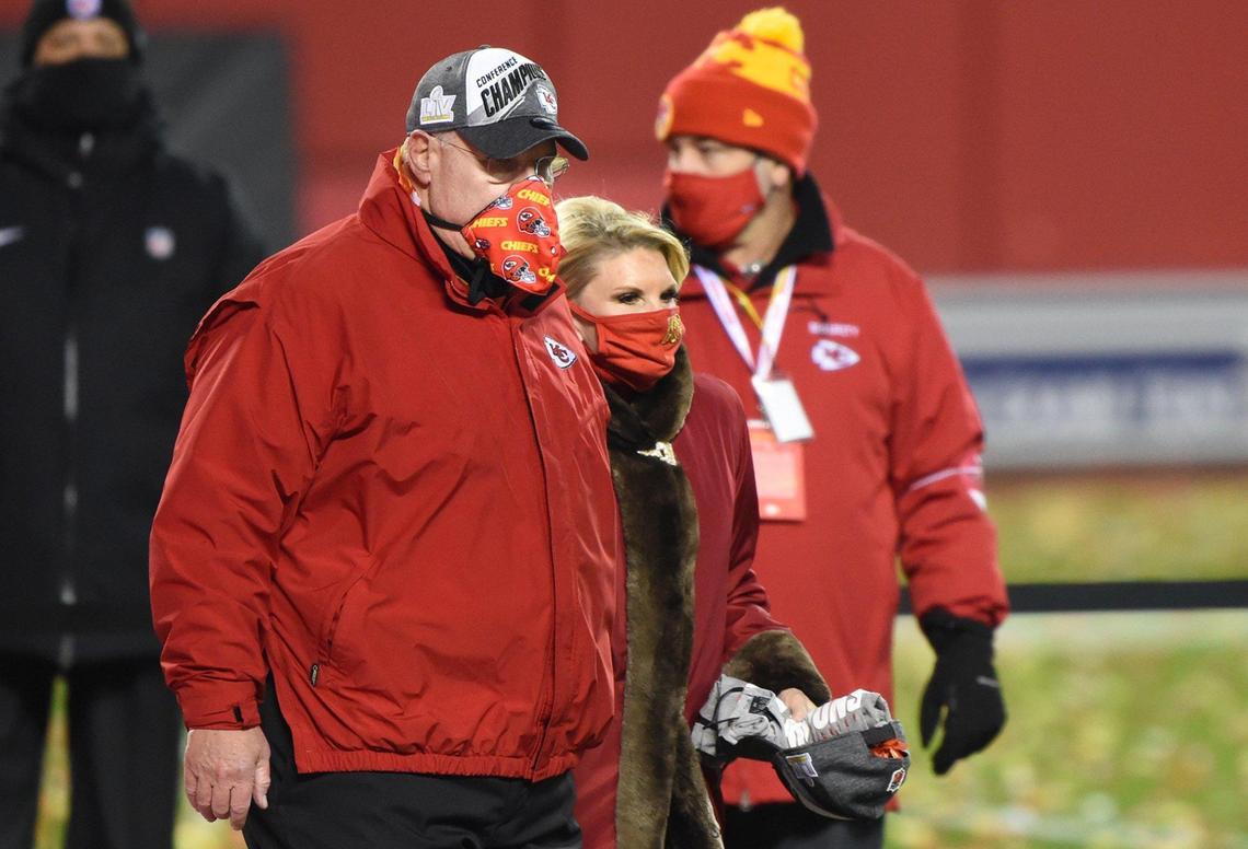 Chiefs head coach Andy Reid walks after the field with his wife, Tammy, after the Chiefs won the AFC Championship Game, 38-24, over the Buffalo Bills on Sunday, Jan. 24, 2021, at Arrowhead Stadium in Kansas City.