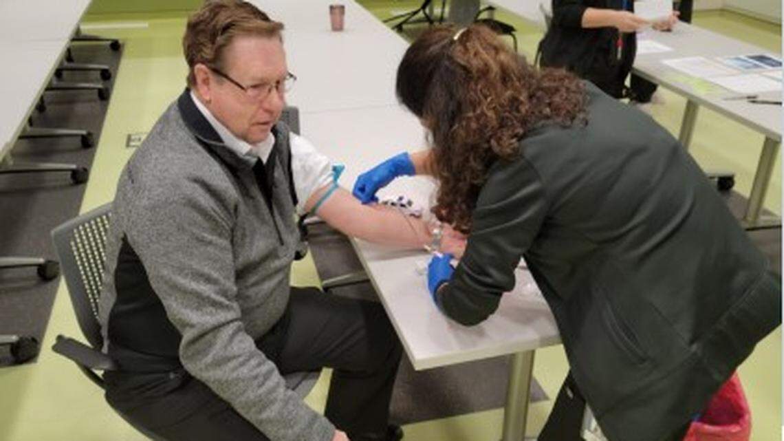 Johnson County Sheriff Calvin Hayden gets his blood drawn for an anti body test. The sheriff’s office on Tuesday said it will partner with biotech company Aditxt to provide antibody tests to sworn staff and civilians in order to test their immunity to COVID-19.