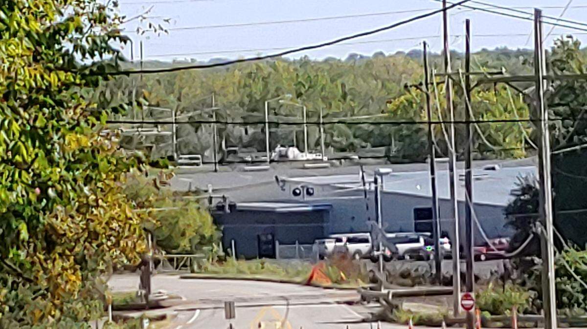 Emergency crews secured a 1,500-foot safety zone south of Kaw Drive on 59th Lane in Kansas City, Kan., early Tuesday afternoon after an 18-wheeled tanker truck overturned while carrying a load of dangerous dry acid. The contents never spilled and the area was cleared by 3:30 p.m.