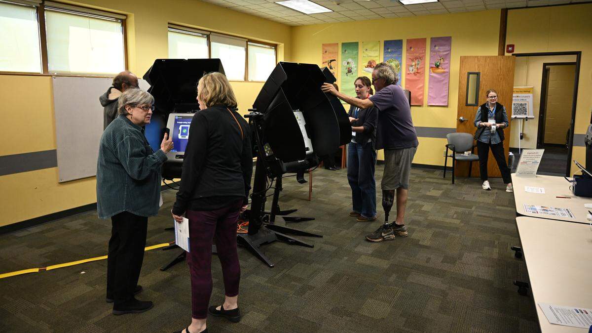 Voters gather to cast their ballot on Election Day, Tuesday, Nov. 4, 2025, at Corinth Library in Prairie Village.