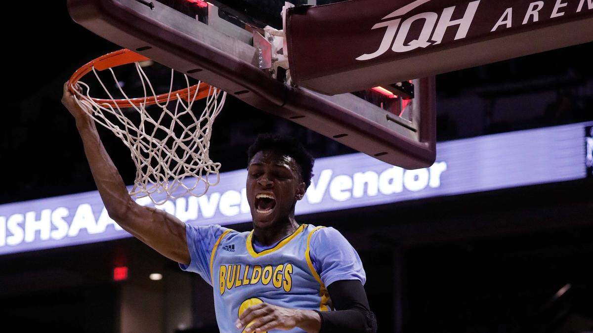 Grandview's Jordan Lathon put down a thunderous dunk in the Missouri Class state championship game on Saturday night .
