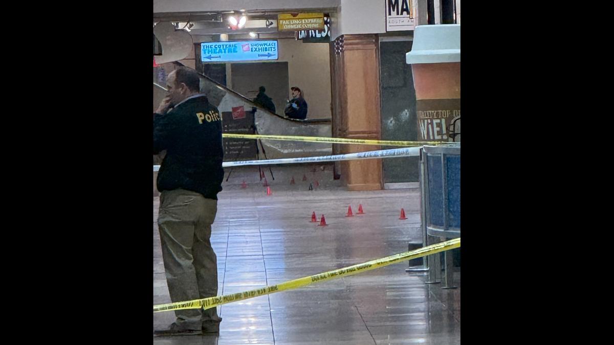 Police mark evidence at Crown Center following a shooting Jan. 17 that wounded six people.