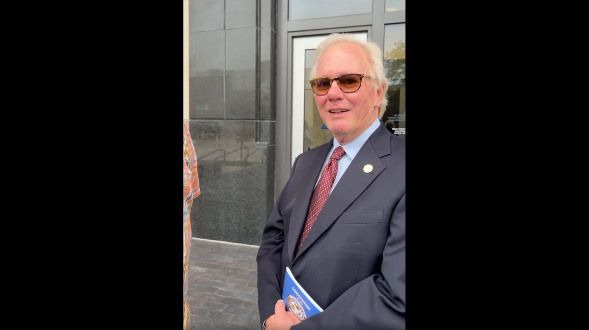 Boilermakers International President Newton B. Jones spoke with angry union members outside the federal courthouse in Kansas City, Kansas, after a hearing on July 27.