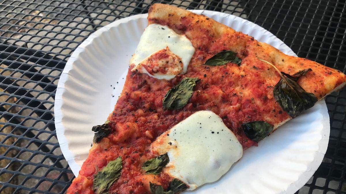 Johnny Jo’s Pizzeria’s fresh mozzarella pizza with basil.