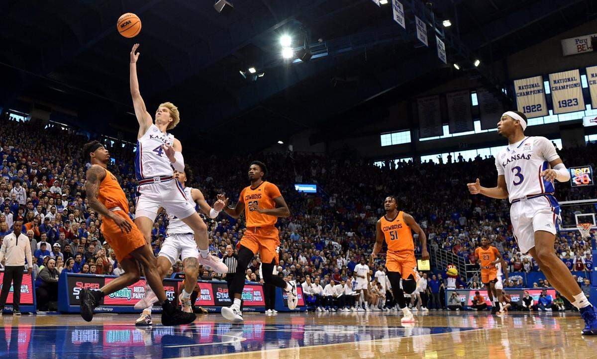 Gradey Dick attempts a floater over Oklahoma State’s Avery Anderson during the first half of a 69-67 KU win at Allen Fieldhouse.