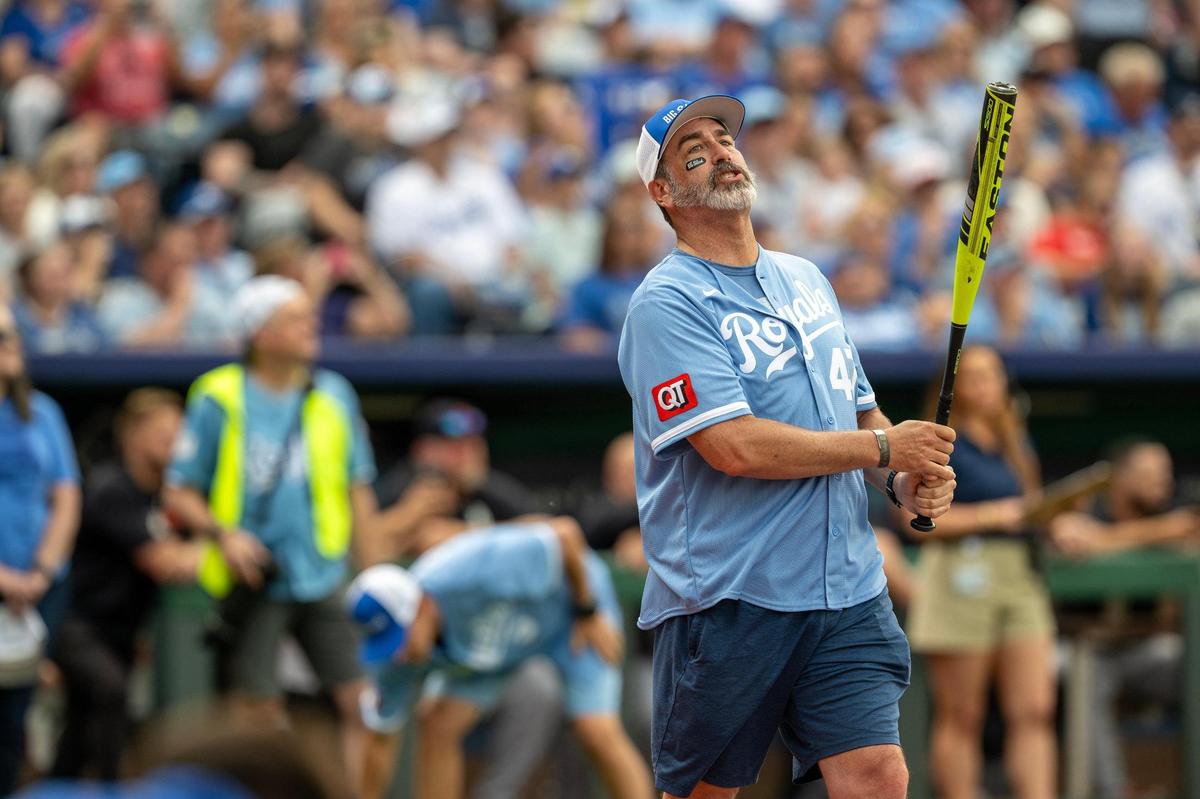 Rob Riggle watches his ball during an at bat during the Big Slick Celebrity Softball game on Friday, May 30, 2025, at Kauffman Stadium in Kansas City.