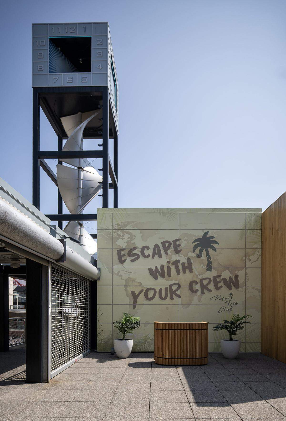 Signage greets guests to the rooftop patio at Palm Tree Club, a restaurant and bar featuring coastal vibe dinning which is opening this month at 14 E. 14th Street in the Power and Light District in Kansas City. The club was seen on Thursday, Sept. 4, 2025, during a media preview.
