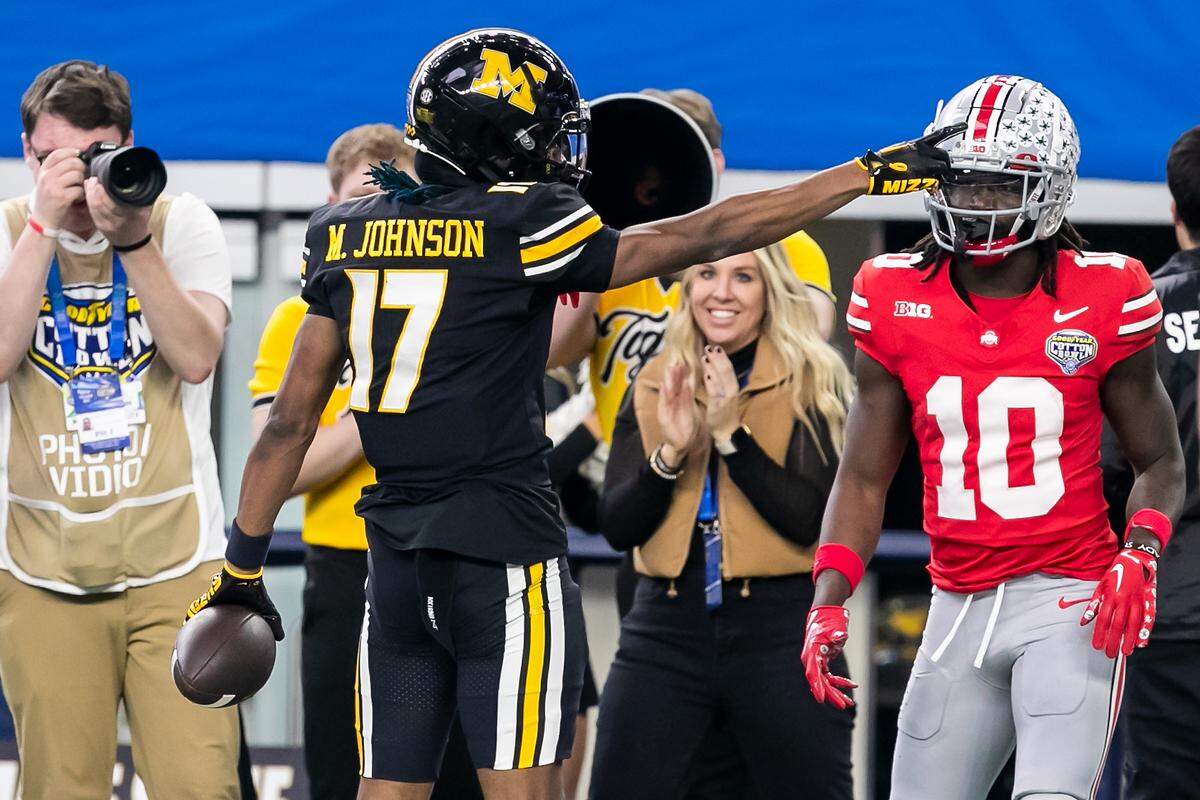 Missouri wide receiver Marquis Johnson (No. 17) signals for a first down during the 88th annual Cotton Bowl game between the Tigers and the Ohio State Buckeyes on Friday at AT&T Stadium in Arlington, Texas.