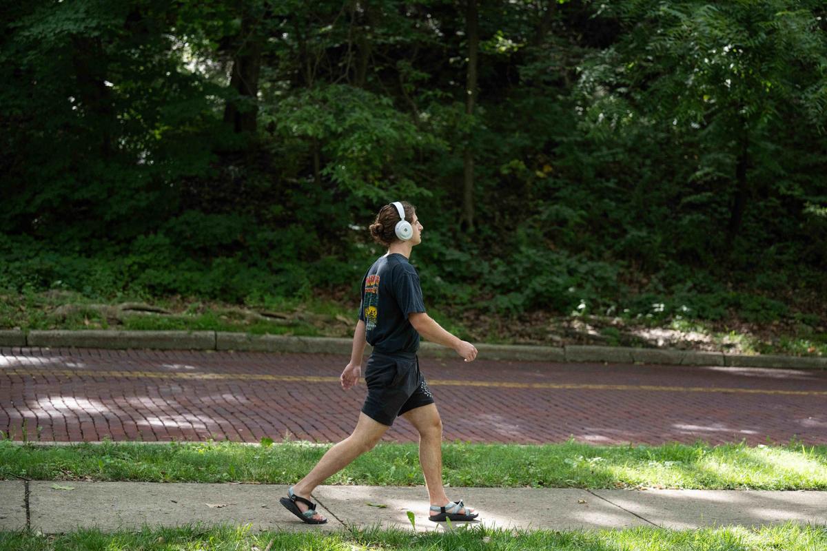 A man walks along a path in Roanoke Park, Kansas City, Missouri, in July.