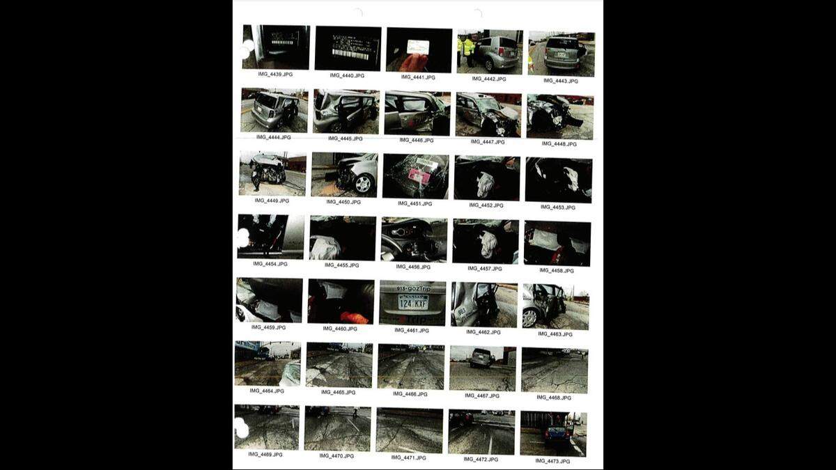 Photos in a police report show damage to a taxi after it was struck by a driver fleeing from Kansas City police on March 17, 2022.