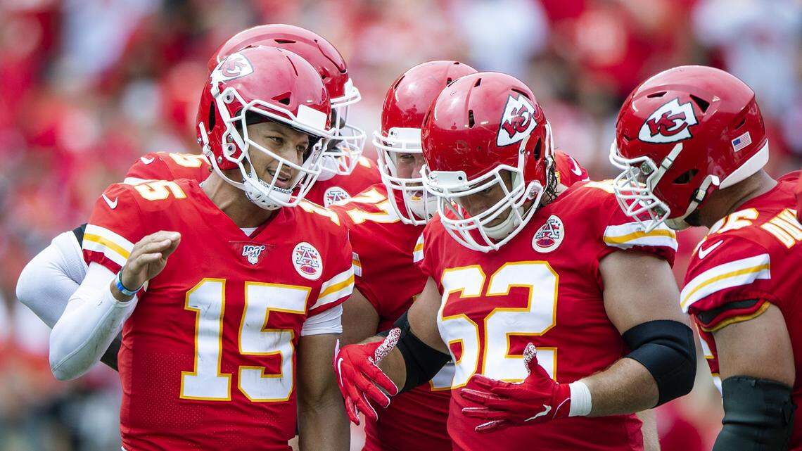 Kansas City Chiefs quarterback Patrick Mahomes huddles with center Austin Reiter and the offense during their game against the Baltimore Ravens on Sunday, September 22, 2019, at Arrowhead Stadium.