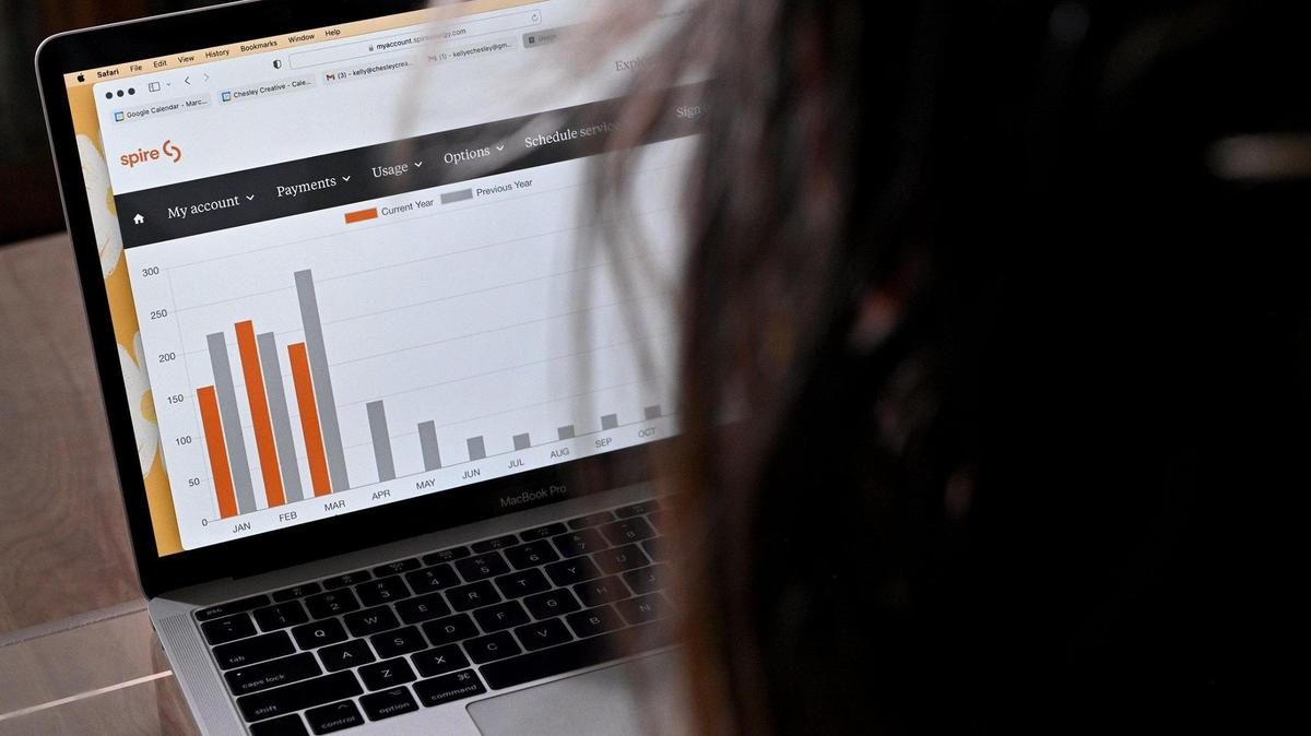 Soaring gas bills have compounded the financial worries of Kelly Chesley and her family after she and her husband experienced income loss due to the pandemic. Chesley logged into her Spire account to show that this winter (orange), the family used less gas than last winter (gray). But the bills were much higher this year.