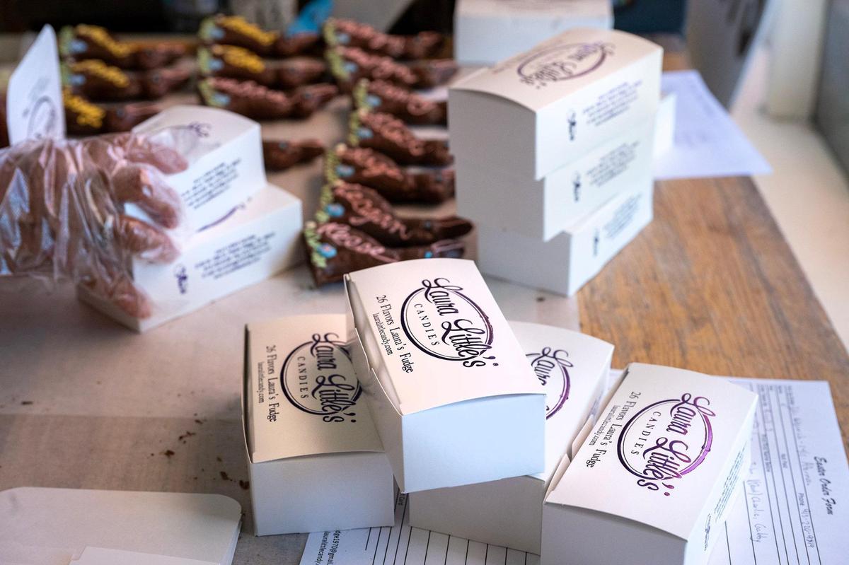 Personalized chocolate Easter bunnies are boxed up at Laura Little’s Candies in Prairie Village.