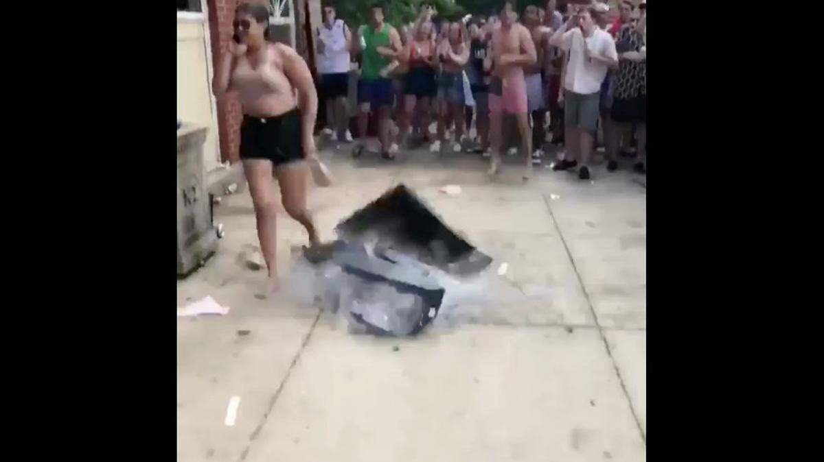 Madison, Wisconsin police are investigating an incident from over the weekend where a TV was thrown from a University of Wisconsin frat house, nearly landing on a woman. Two Instagram videos show the incident from different angles.