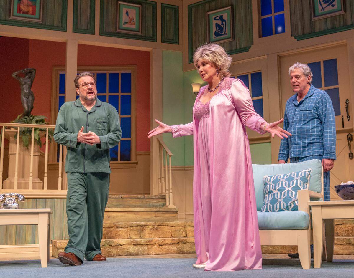 “Don’t Dress for Dinner” is Morgan Fairchild’s third play at the New Theatre and Restaurant, all since 2014. She appears in this scene with Craig Benton, left, and John Rensenhouse.