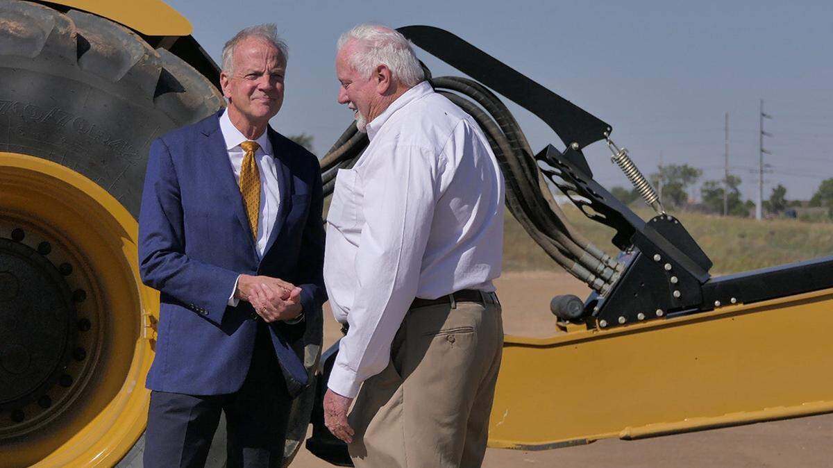 U.S. Sen. Jerry Moran speaks with Dodge City Mayor E. Kent Smoll during the Hilmar Cheese Company breaking ground event on Sept. 30, 2022 in Dodge City. P1620934 2