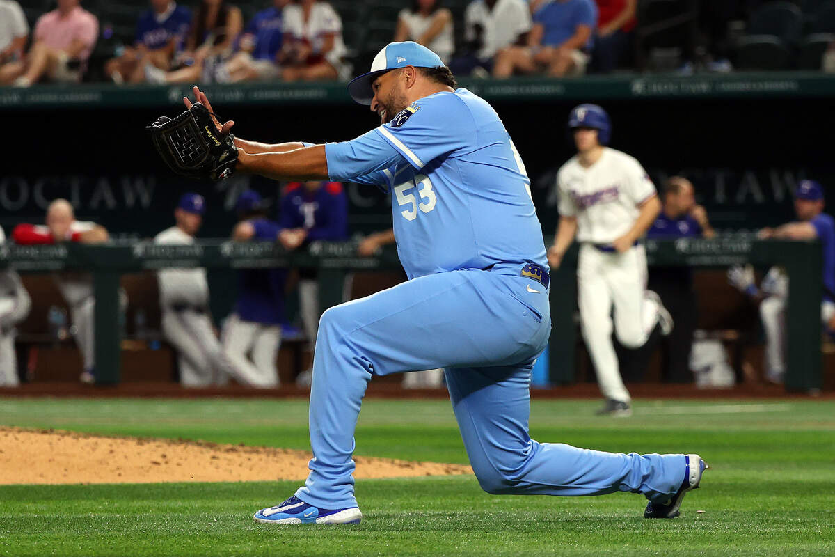 Carlos Estévez #53 of the Kansas City Royals reacts after the final out for the save against the Texas Rangers at Globe Life Field on June 18, 2025 in Arlington, Texas.