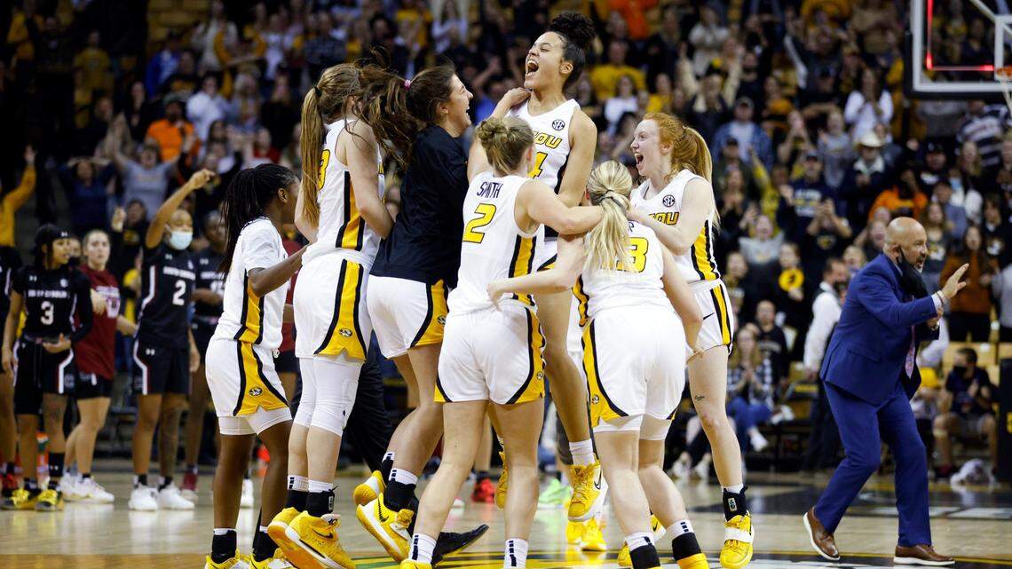 Missouri Tigers players celebrate at the end of Thursday night’s overtime victory against No. 1-ranked South Carolina at Mizzou Arena in Columbia, Mo.