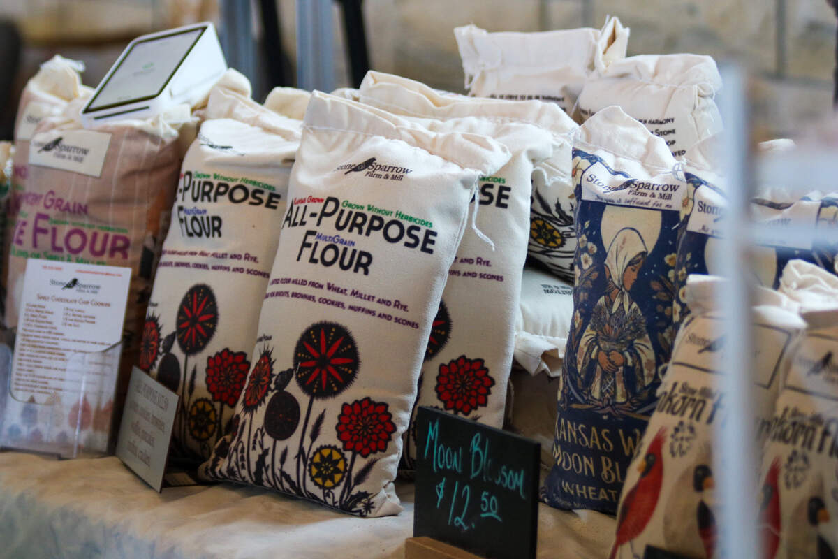 A vendor sells flour at the Overland Park Farmer’s Market on June 6, 2026.