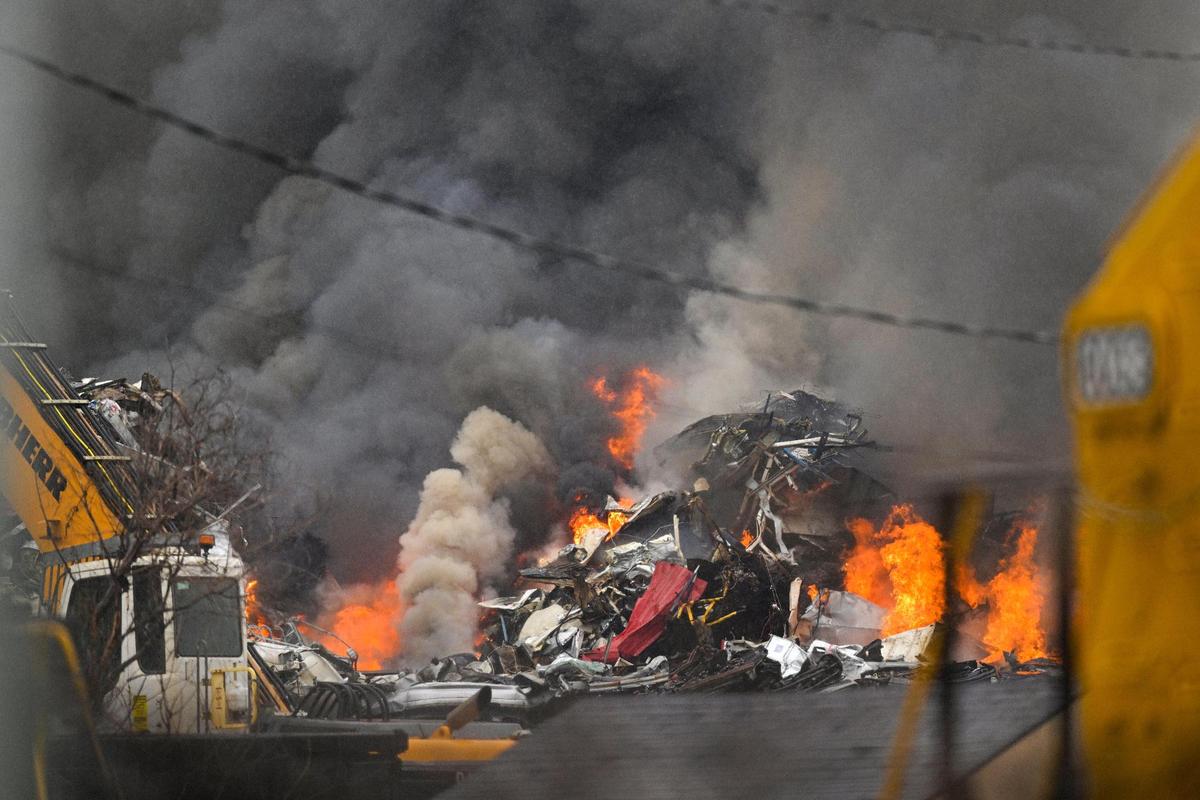 The heat from a fire at Advantage Metals in Kansas City, Kansas, was too intense for firefighters to stand nearby, forcing them to either attack the fire from a distance or use a ladder to spray water from above the blaze.