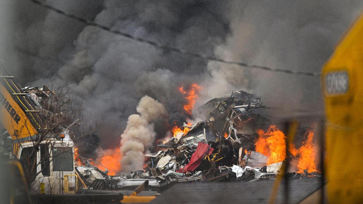 Smoke and flames billow from a large, industrial fire at Advantage Metals Recycling, 1153 South 12th Street on May 19, 2023, in Kansas City, Kansas. Crews from the Kansas City, Kansas, Fire Department were on the scene battling the blaze.