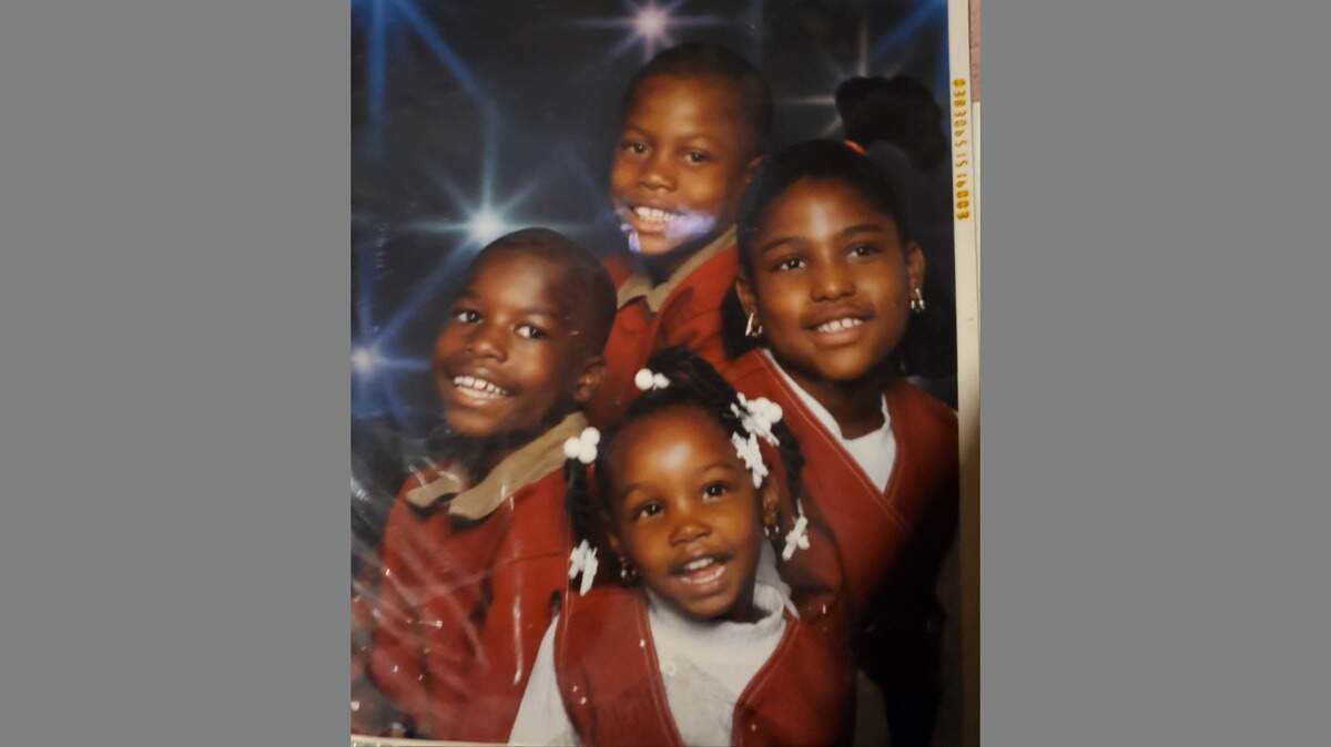 Terrance Bridges, left, is pictured with three of his siblings. His brother, top, Raydale Davenport was killed in 2006.