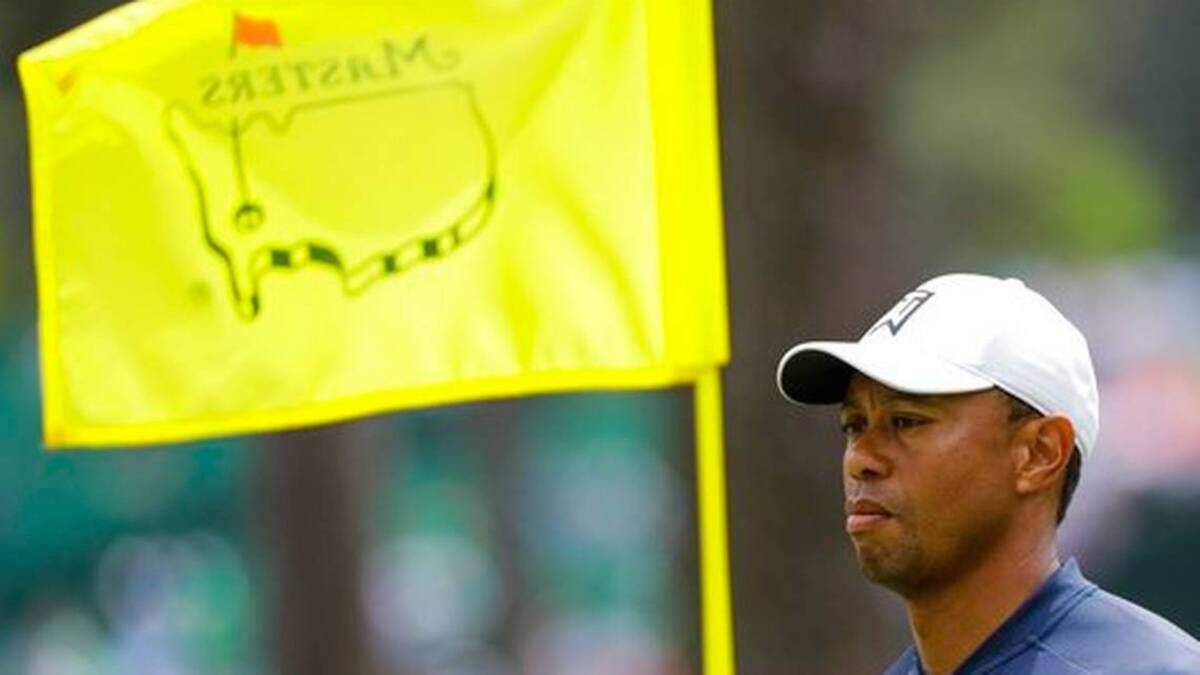 Tiger Woods walks on the sixth green during a practice round for the Masters golf tournament Wednesday, April 4, 2018, in Augusta, Ga.