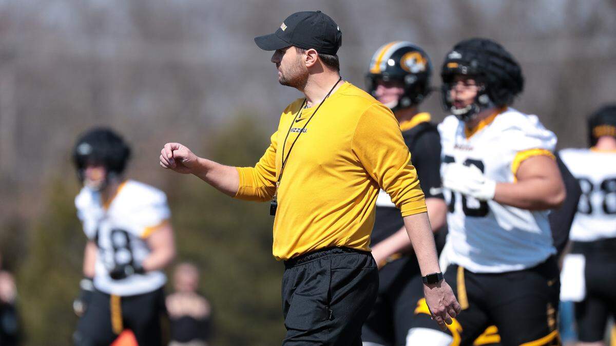 Missouri tight end coach and recruiting coordinator Casey Woods coaches the Tigers during a spring practice.