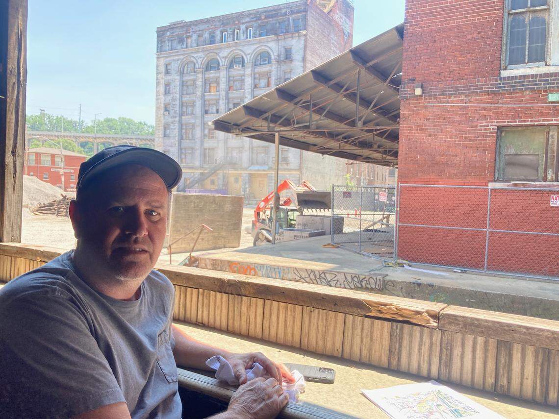 Josh Mobley, co-owner of The Ship bar and restaurant, is generally supportive of West Bottom development but worries about rising property tax assessments and whether, under uncertain economic conditions, the project will emerge as developers envision.