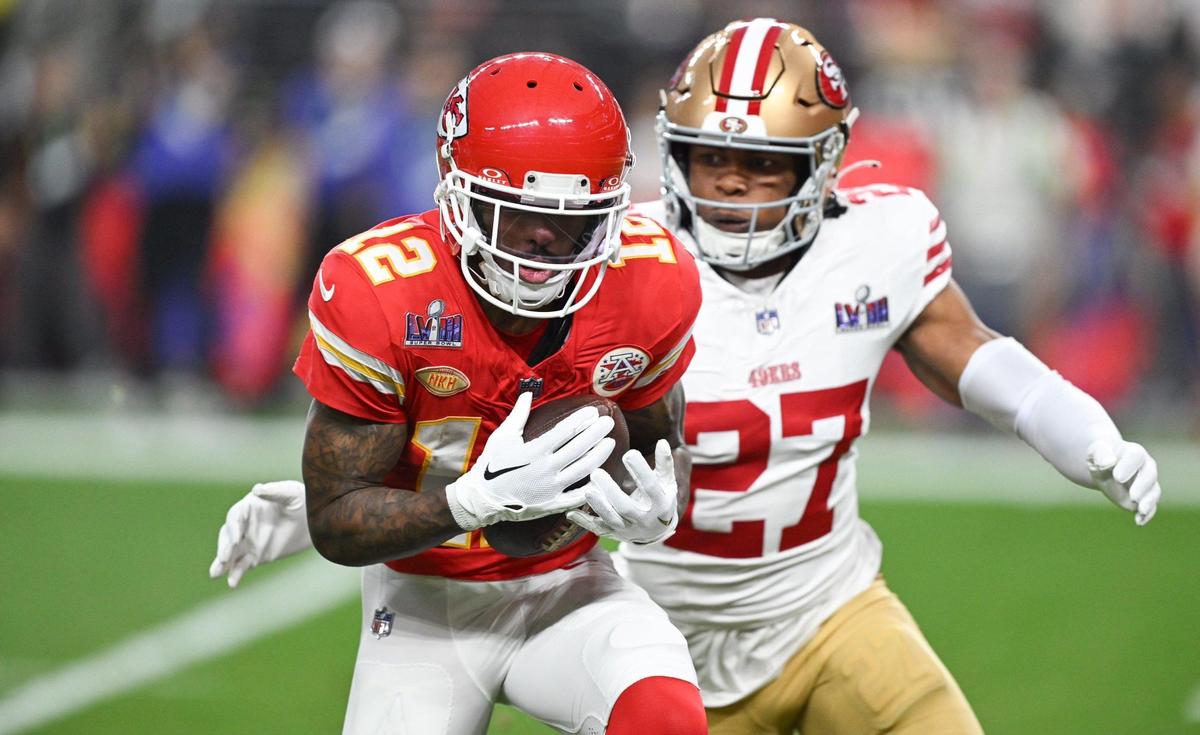 Kansas City Chiefs wide receiver Mecole Hardman Jr. (12) makes a 52-yard reception in front of San Francisco 49ers safety Ji’Ayir Brown (27) in the second quarter of Super Bowl LVIII, Sunday, Feb. 11, 2024, in Las Vegas.