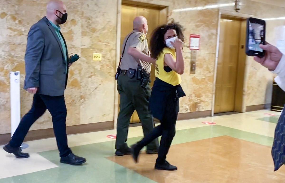 Maya Neal of KC Tenants was one of two protesters arrested at the Jackson County Courthouse Thursday morning after disrupting the eviction docket hearing. Several protesters were removed from the 7th floor hearing. Many were simply taken downstairs and returned moments later to once again halt proceedings, saying “evictions are violence.”
