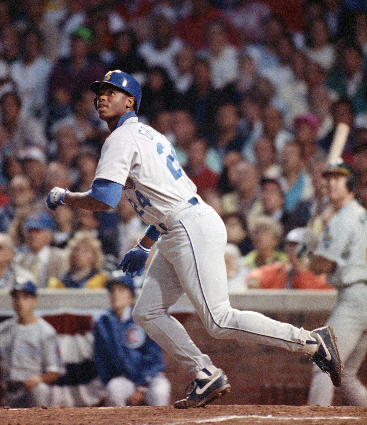 ** ADVANCE FOR WEEKEND EDITIONS, APRIL 4-5 ** FILE ** In this July 10, 1990 file photo, Seattle Mariners outfielder Ken Griffey Jr. is seen during baseball’s All-Star game at Wrigley Field in Chicago. (AP Photo/File)