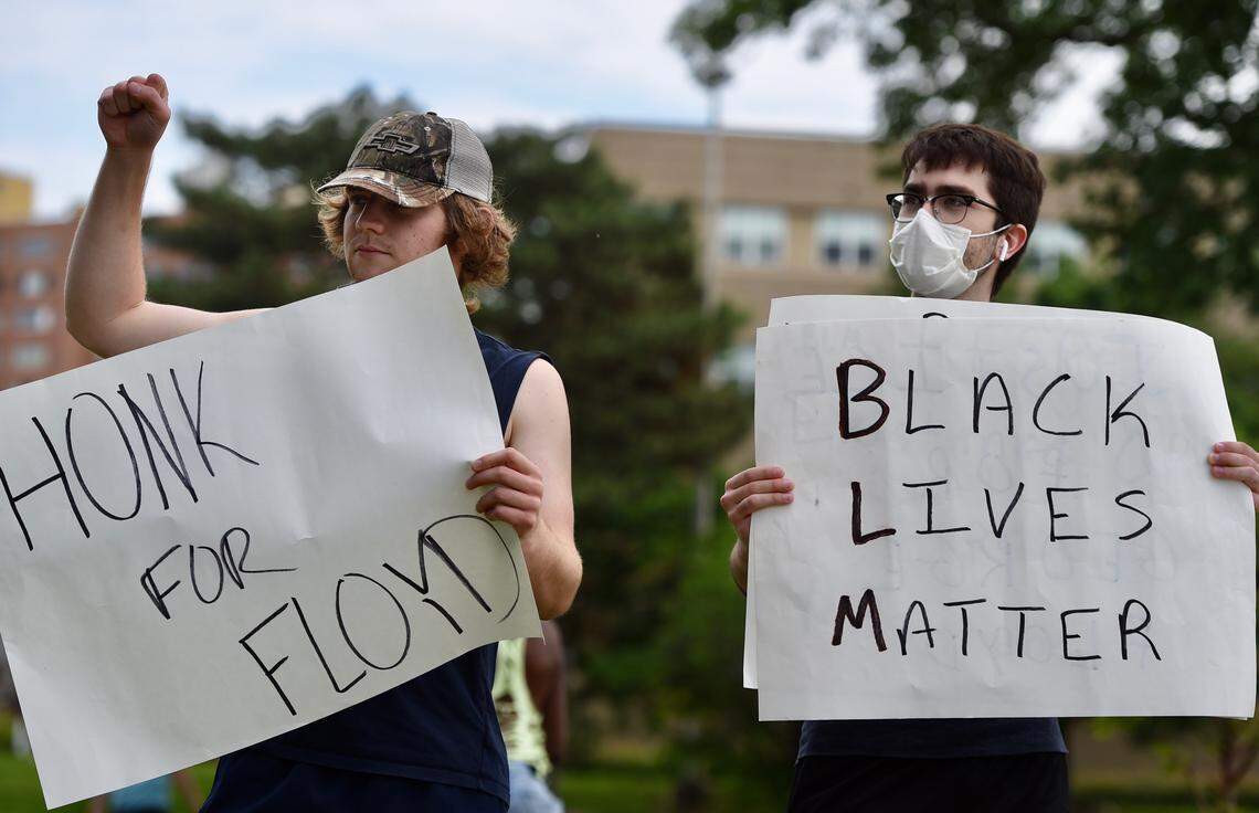 Alexa Azyin, of Kansas City, and Andrew Aklagi, of Overland Park, arrived early for a George Floyd protest at the Country Club Plaza in Kansas City. Protests were sparked across the country after a Minneapolis police officer was accused of killing Floyd during an arrest.